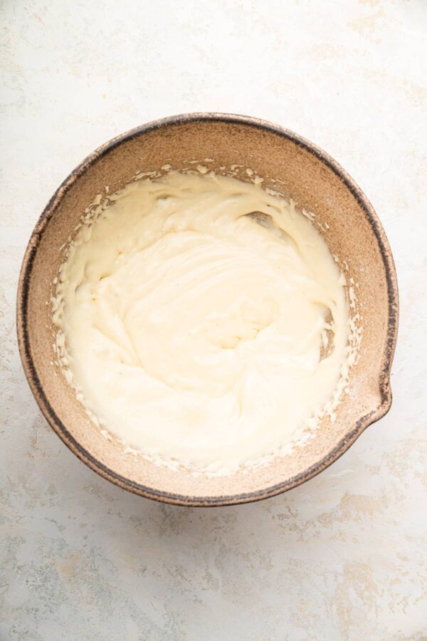 buttercream frosting for decorating cookies in a bowl.