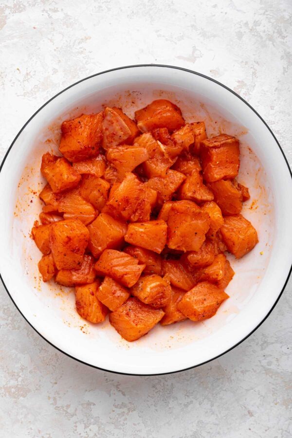 chopped raw salmon tossed with smoke paprka.