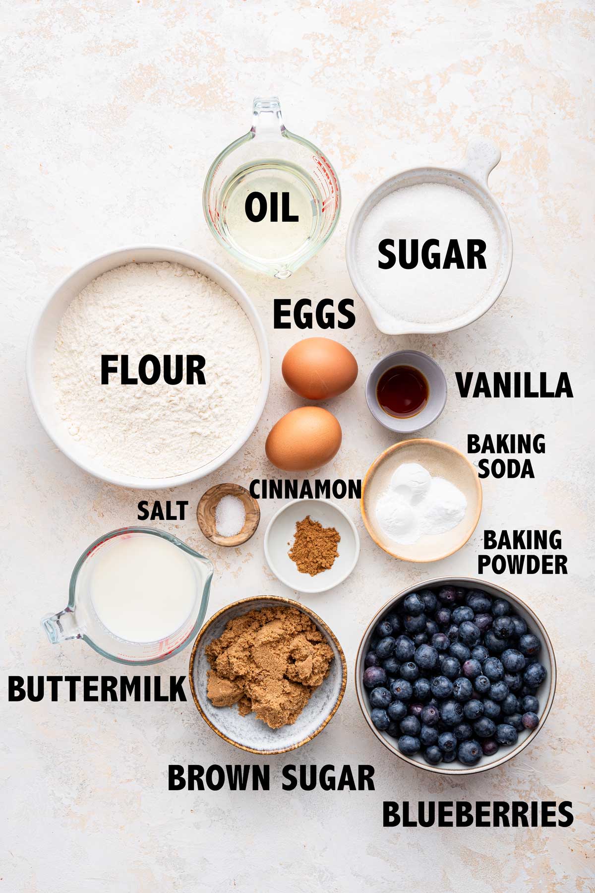 overhead photos of ingredients used to make homemade blueberry muffins.