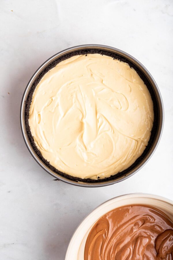 oreo crust with peanut butter cheesecake batter on top.