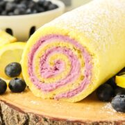 lemon cake roll filled with blueberry cream cheese frosting.