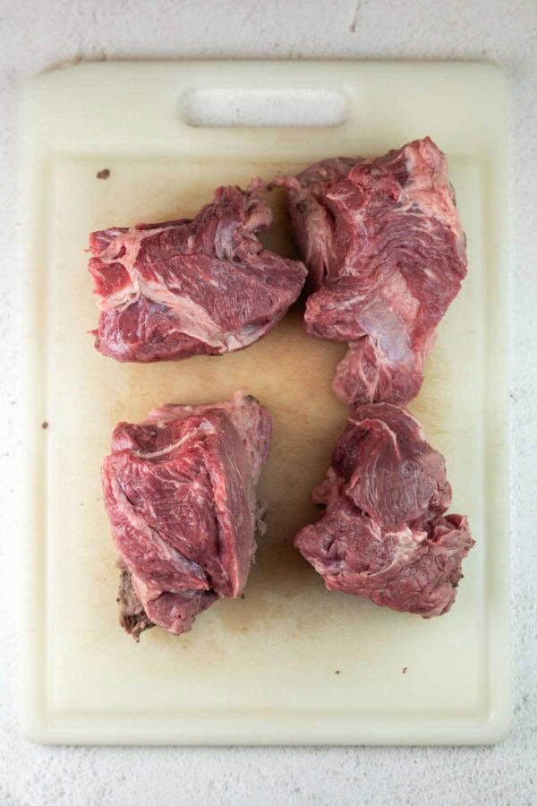 chuck roast cut into four large pieces.