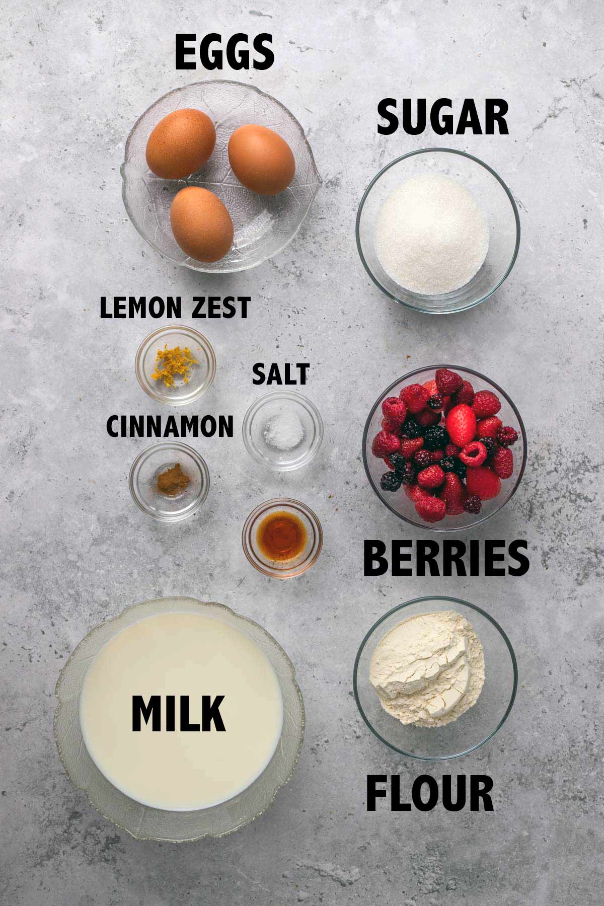 overhead view of ingredients used to make a berry clafoutis.