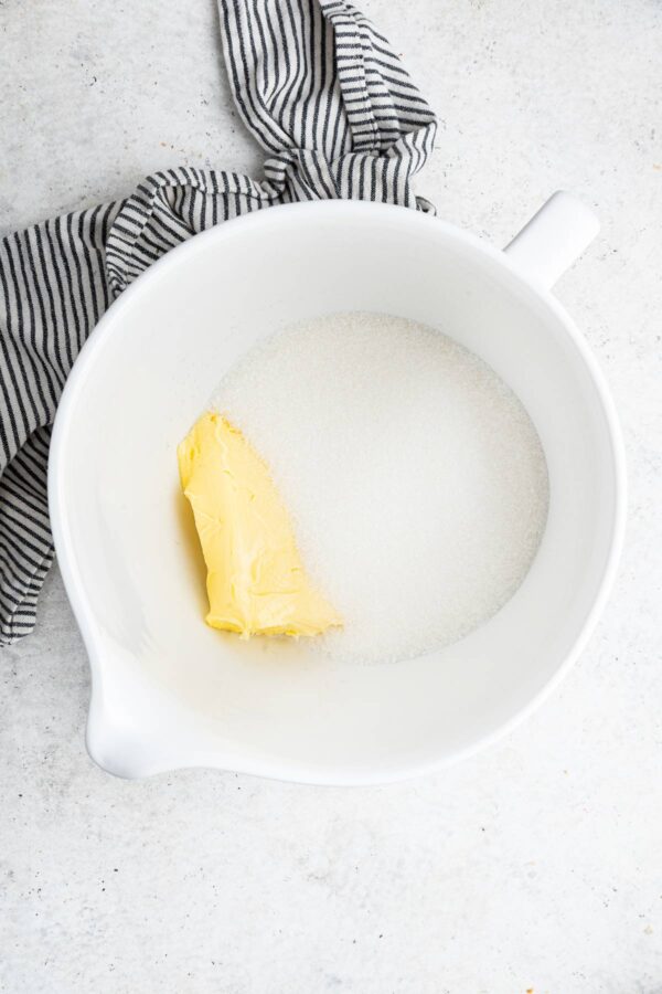 butter and sugar in a mixing bowl.