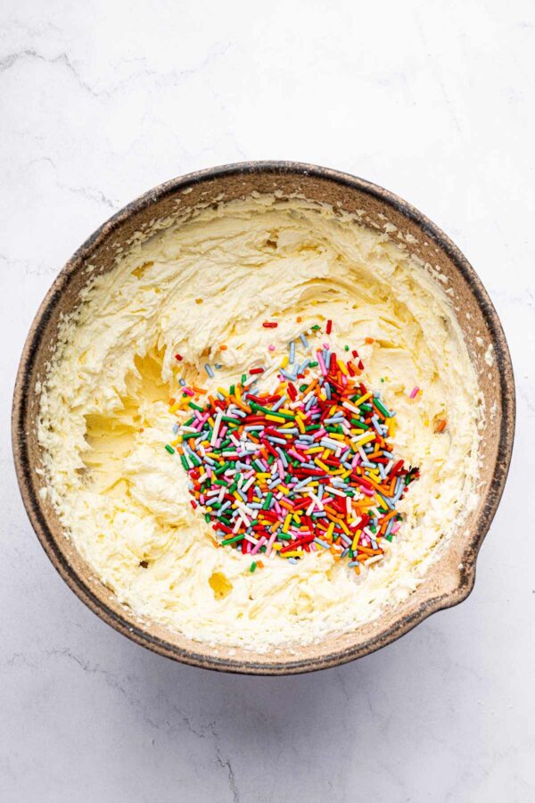 homemade funfetti buttercream in a mixing bowl.