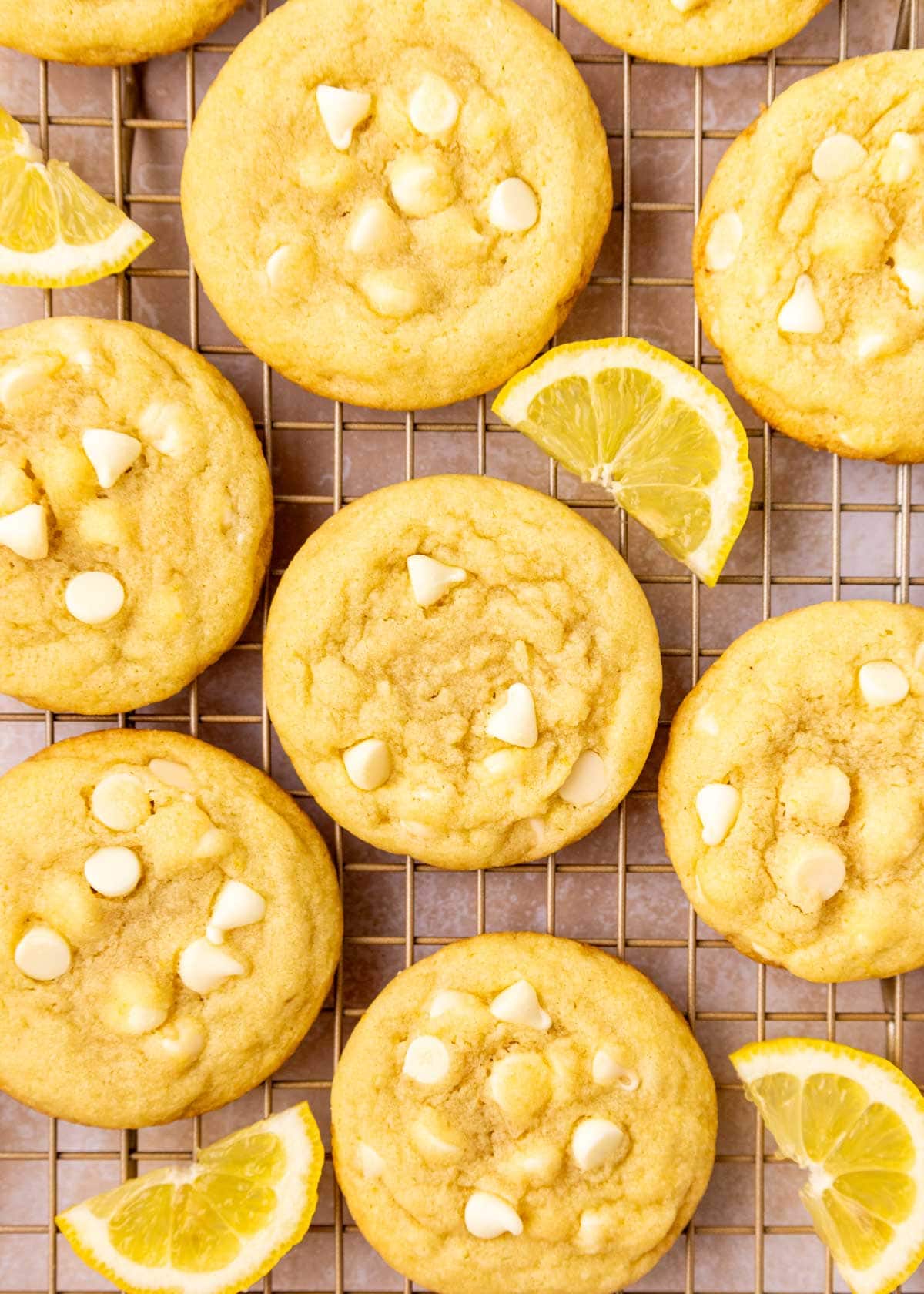 overhead view of white chocolate lemon cookies on a cooling rack.