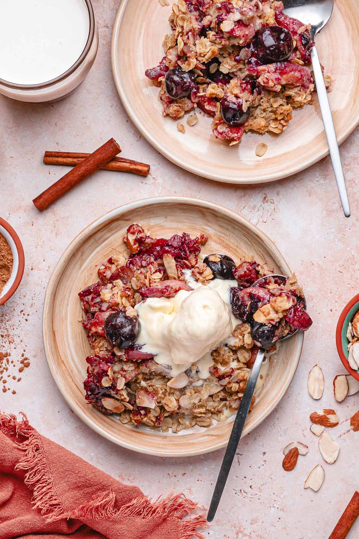 two servings of summer fruit crisp.