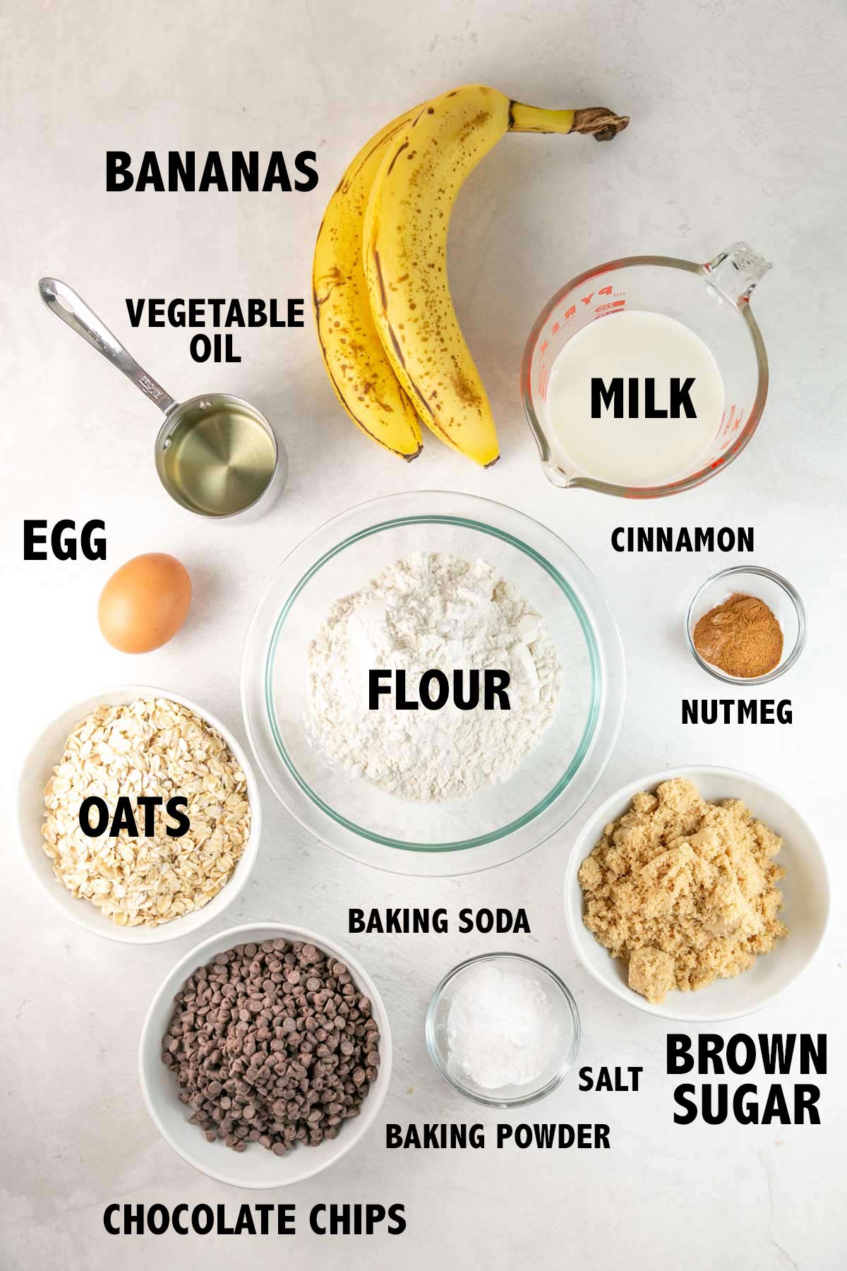 overhead view of ingredients used to make oatmeal banana muffins.