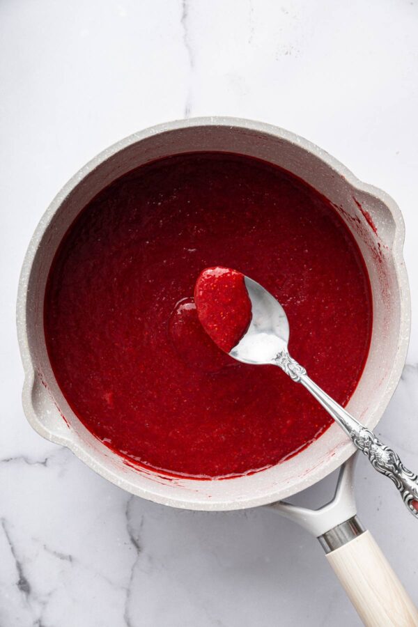 cooked down strawberry puree with a thick consistency.