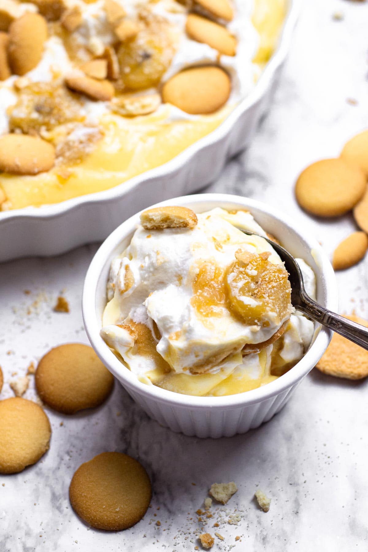 small ramekin filled with caramelized banana pudding.
