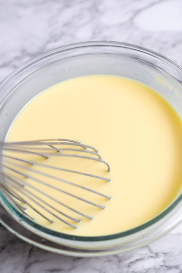 vanilla pudding setting in a mixing bowl.