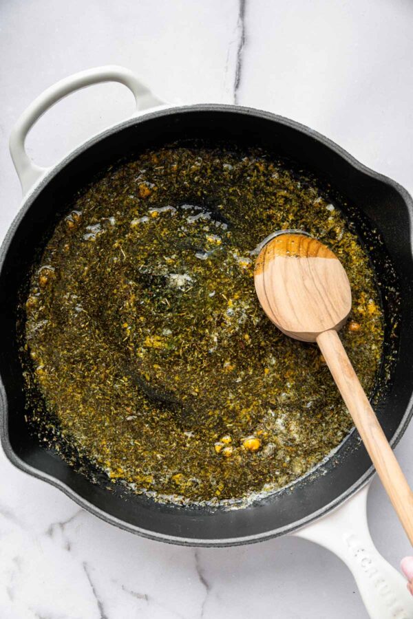 melted butter, herbs, and orange zest in a saute pan.