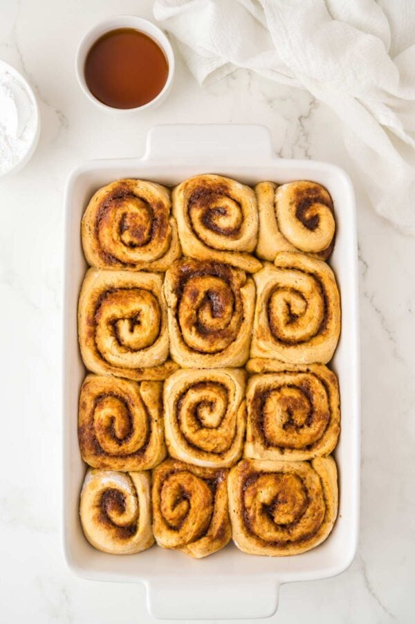 freshly baked cinnamon rolls before frosting.