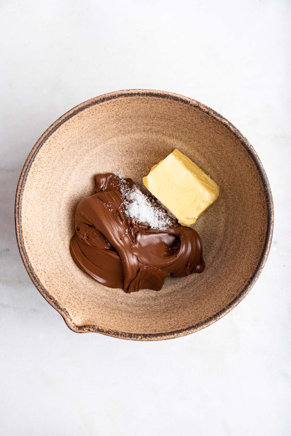 butter, nutella, and salt in a mixing bowl.