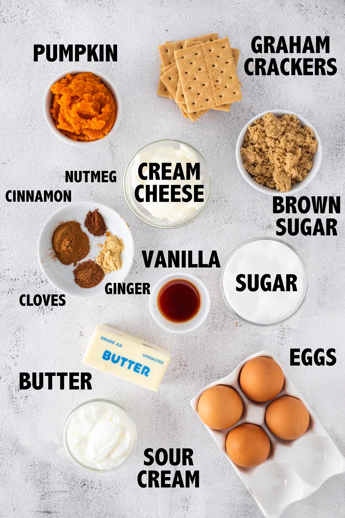 overhead view of ingredients used to make pumpkin swirl cheesecake.