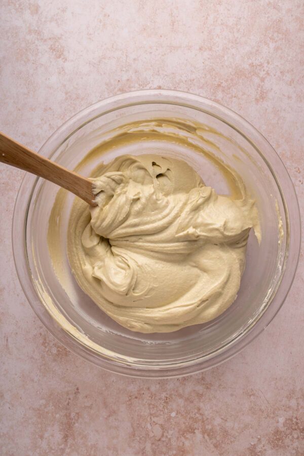 filling for pistachio pie in a mixing bowl.