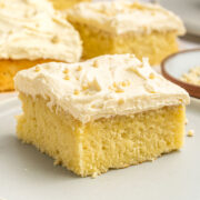 slice of vanilla sheet cake with vanilla icing