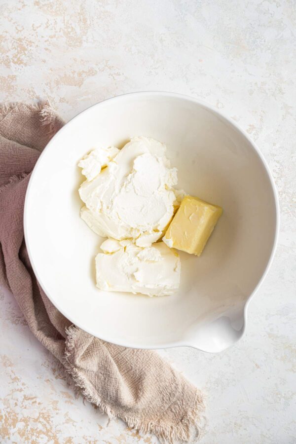 cream cheese and butter in a mixing bowl.