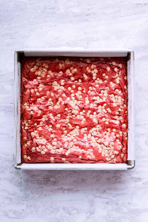 red velvet brownies with white chocolate chips still in the pan.