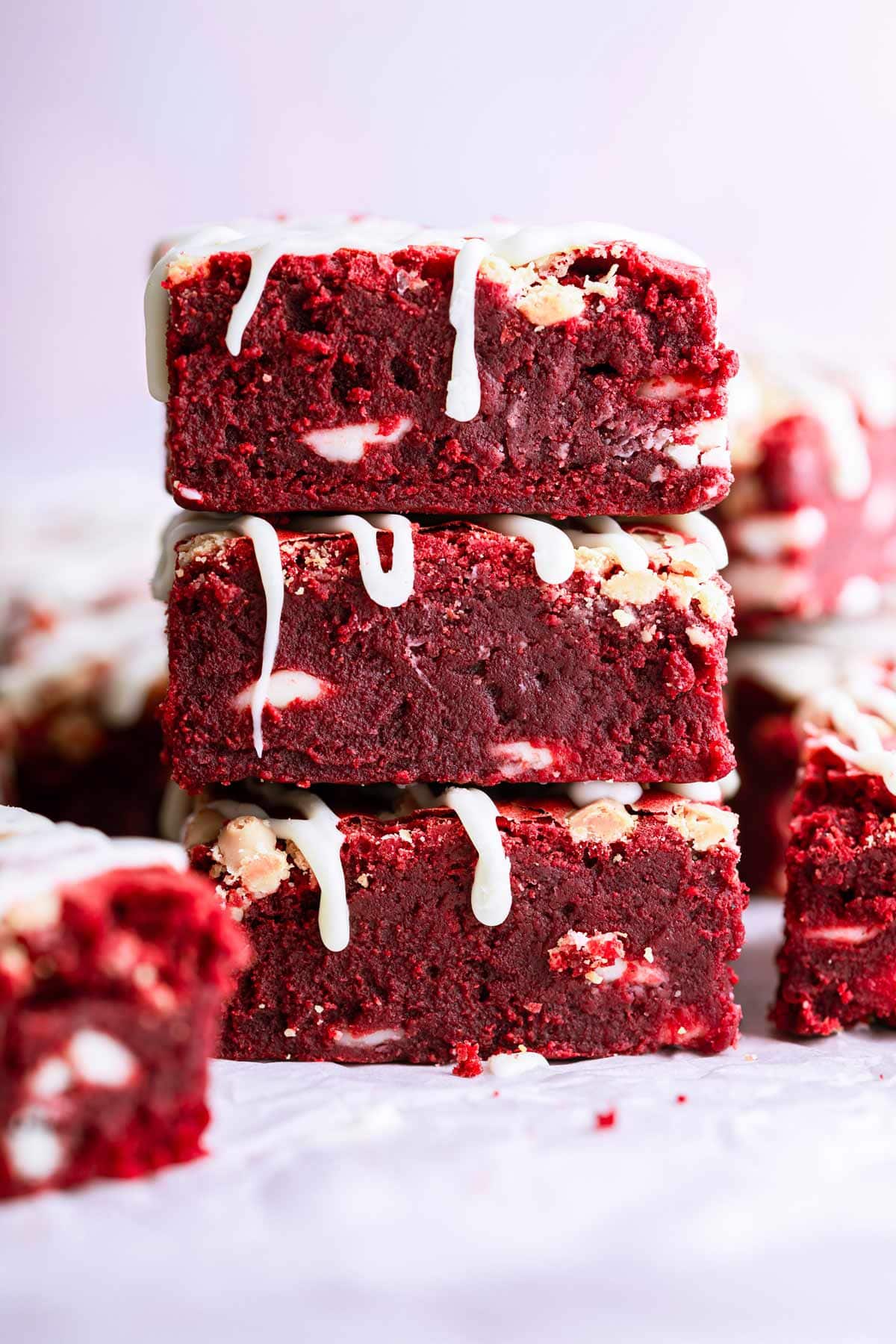 three brownies stacked vertically on top of each other.