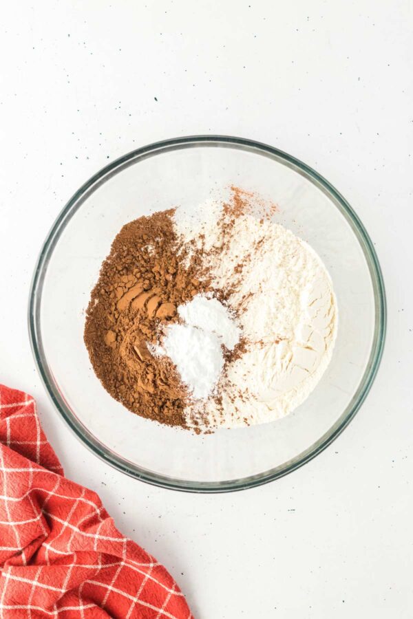 dry ingredients to make cupcakes in a mixing bowl.