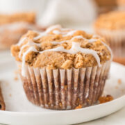 coffee cake muffin with a vanilla glaze drizzle.