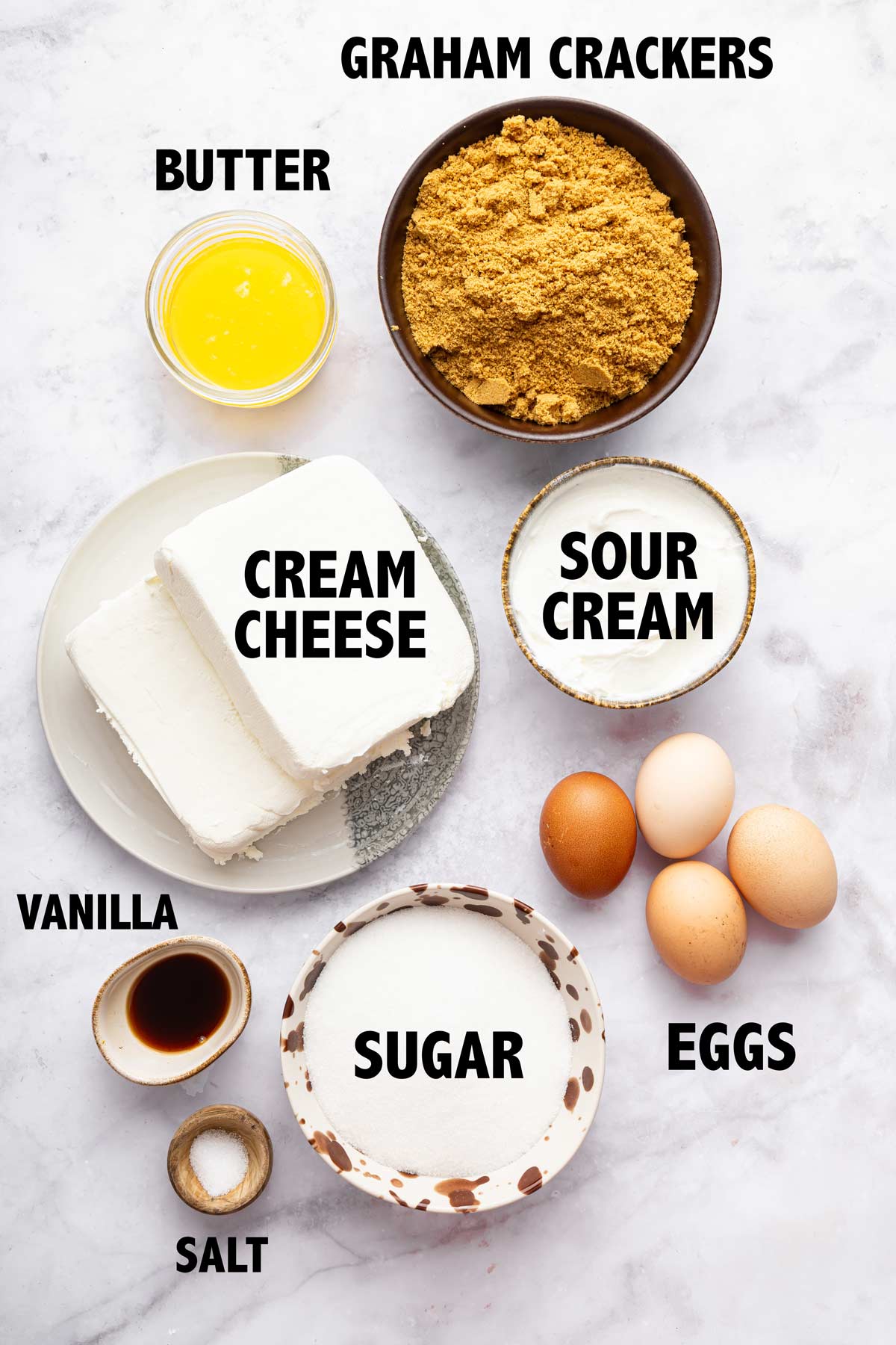 overhead view of ingredients used to make a cheesecake.