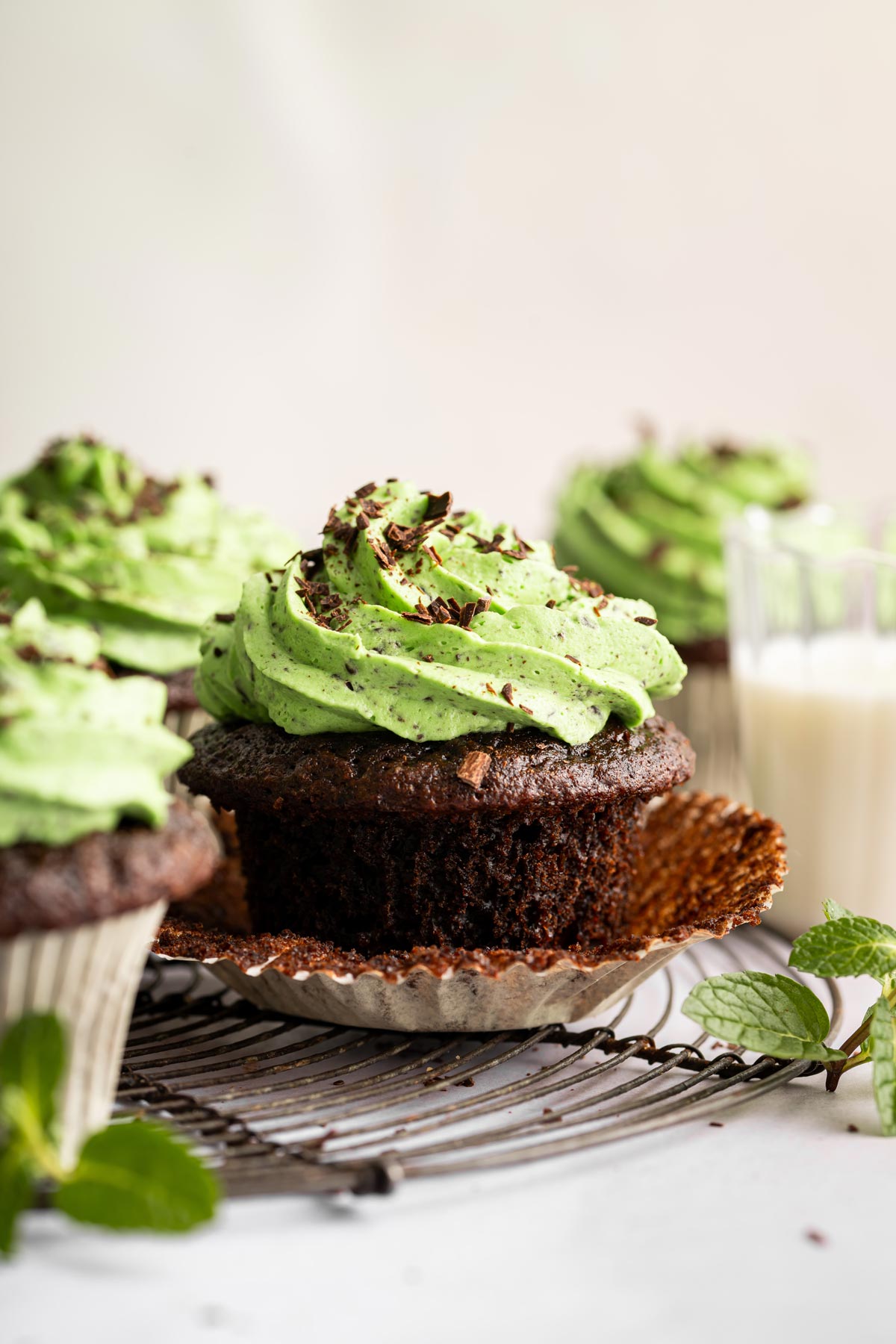 mint chocolate chip cupcake with the cupcake wrapper removed.