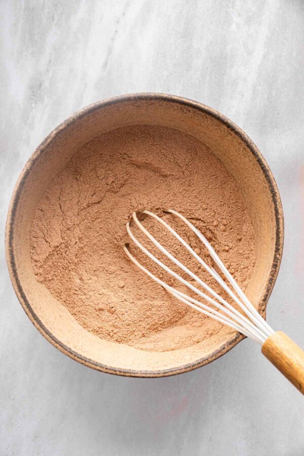 whisked dry ingredients to make chocolate cupcakes.