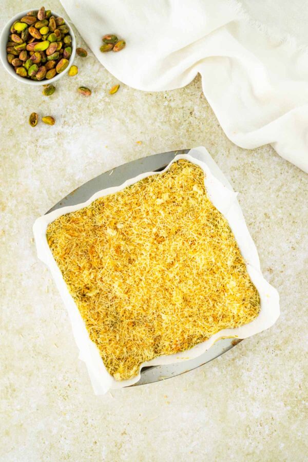 toasted kataifi layered on top of brownies.