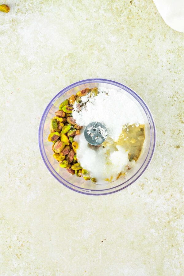 pistachios, powdered sugar, vanilla, and salt in a food processor.