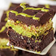 dubai chocolate brownie with layers of pistachio cream and kataifi crunch.