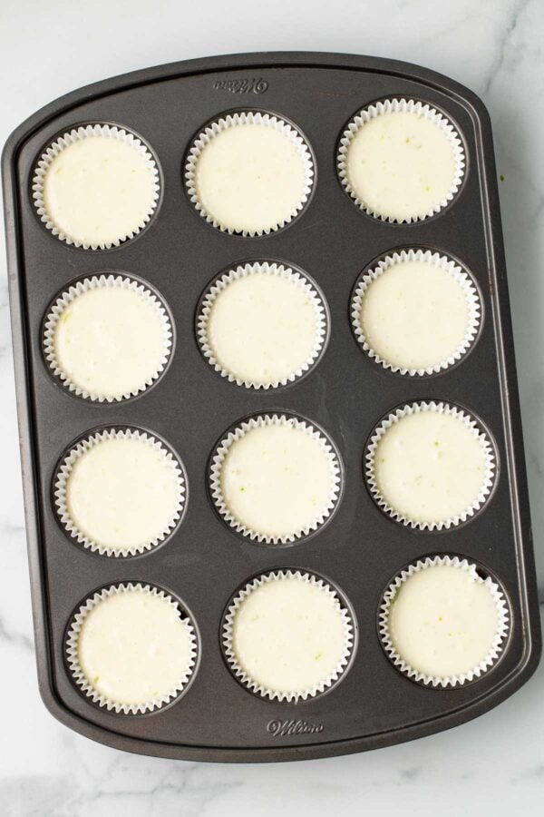 unbaked cupcakes in a cupcake tin.