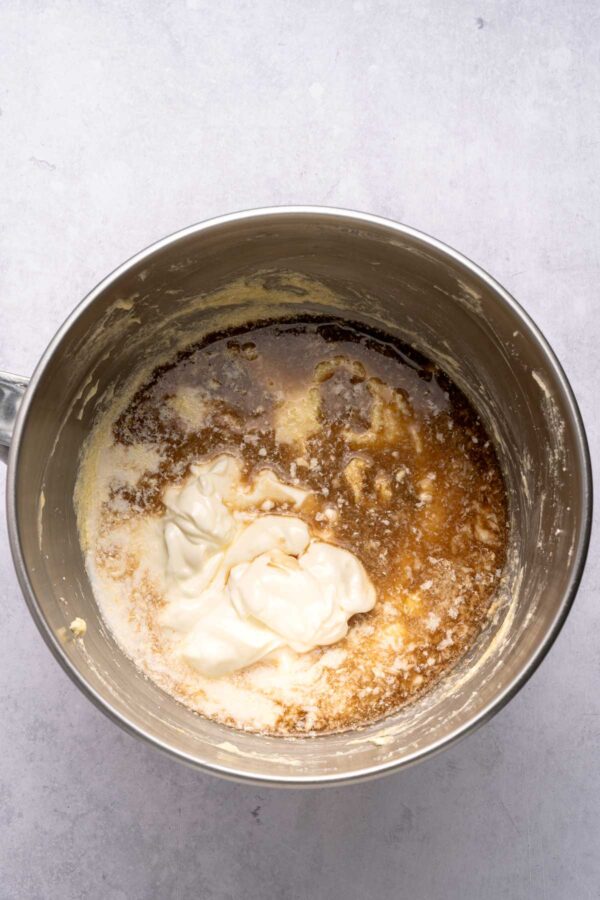 eggs, milk, and sour cream in a mixing bowl.