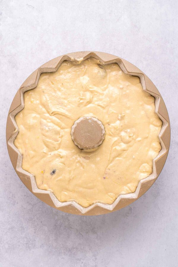 cake batter in a decorative bundt cake pan.