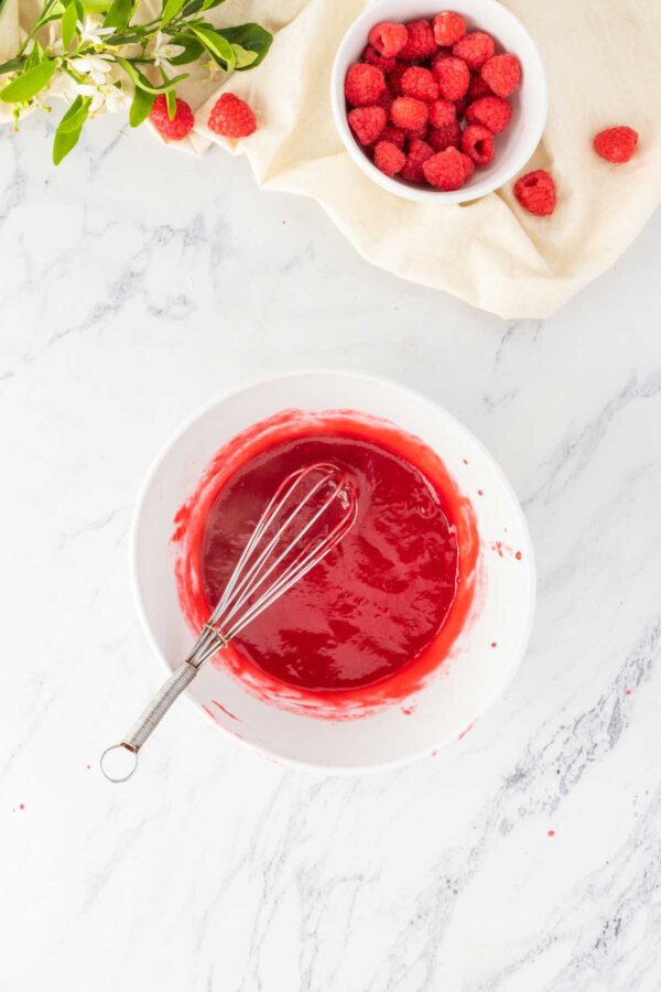 raspberry puree made from cooked raspberries, sugar, and cornstarch.