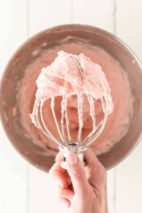 fresh strawberry buttercream in a stand mixer bowl.