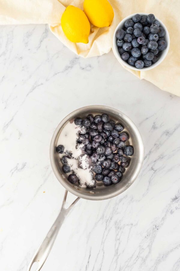 blueberries and sugar in a small saucepan.