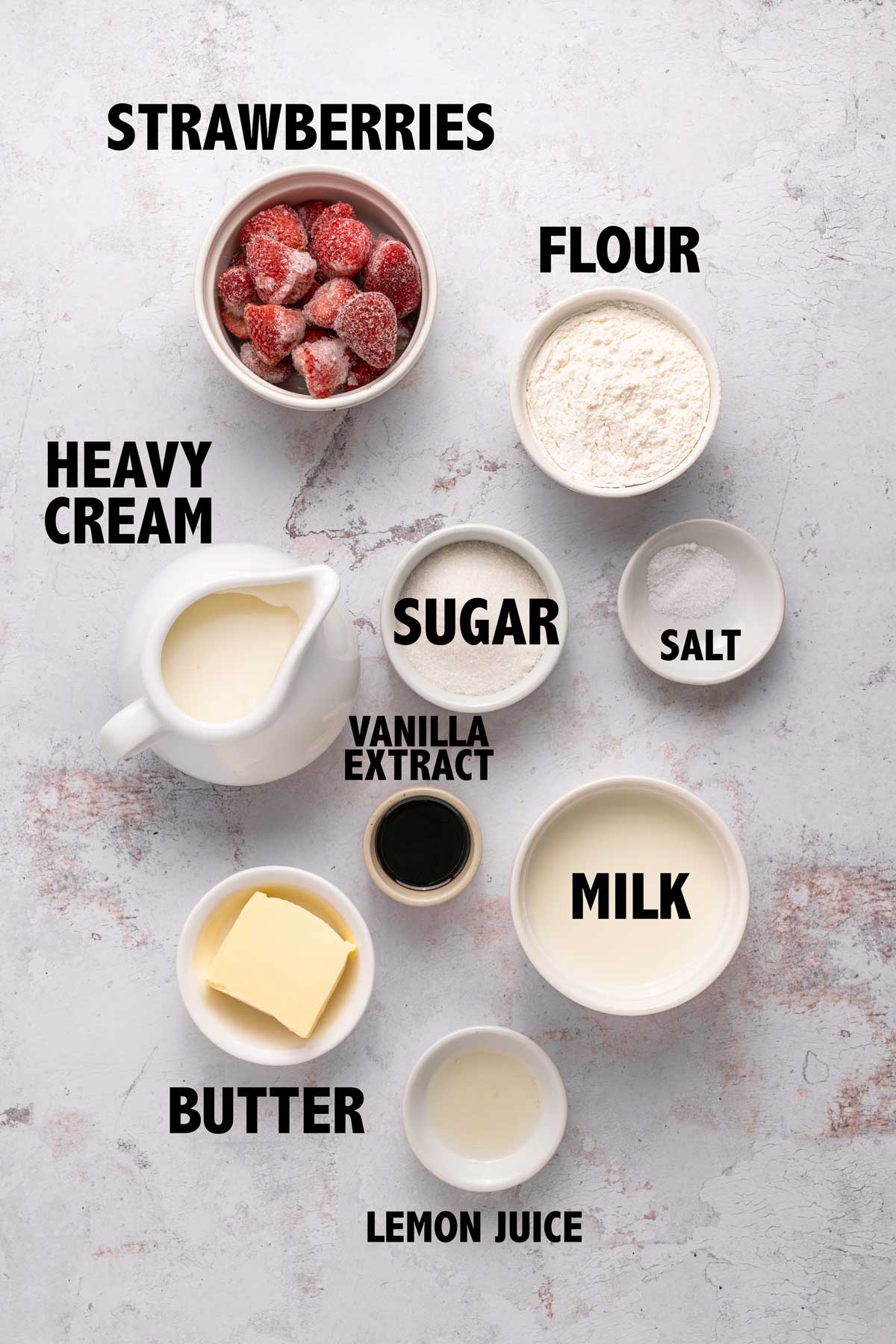 overhead view of ingredients used to make strawberry shortcake ice cream.