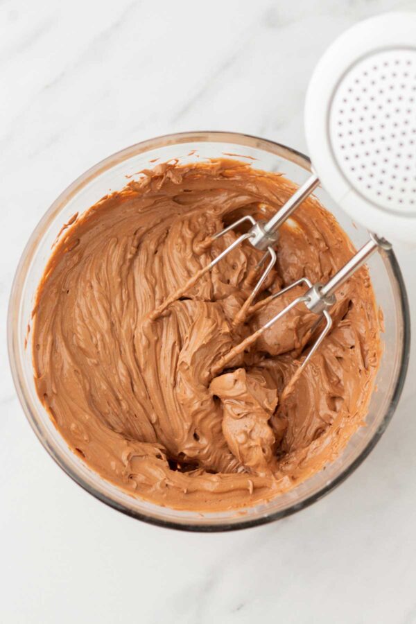 whipping chocolate ganache to make frosting.