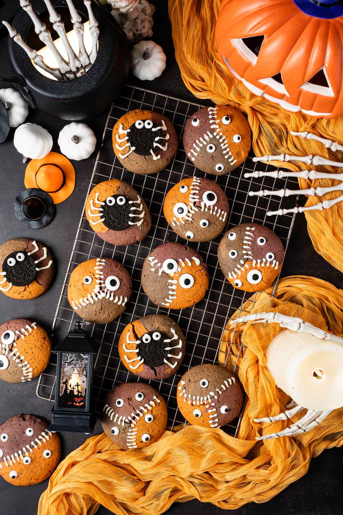 orange, purple, and black thick cookies decorated for Halloween.