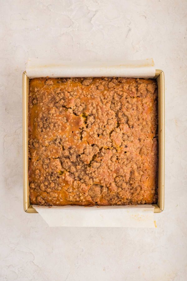 freshly baked pumpkin coffee cake still in the pan.