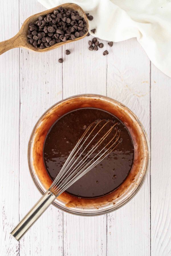 chocolate cupcake batter in a glass mixing bowl.