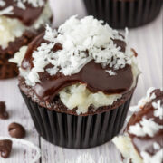 chocolate cupcake with coconut and ganache topping.